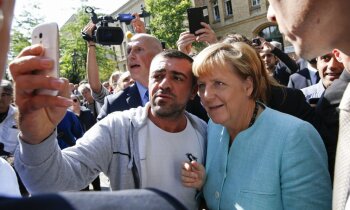 Reportāža: Kā 'Mamma Merkele' un Vācija tiek galā ar bēgļiem