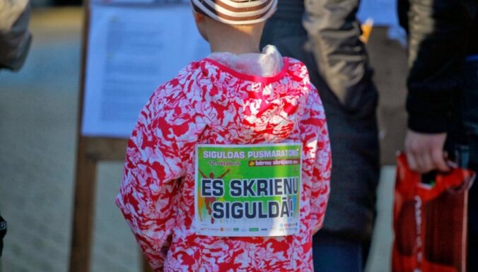 Fotoreportāža: Siguldas 'zelta lapu' pusmaratons