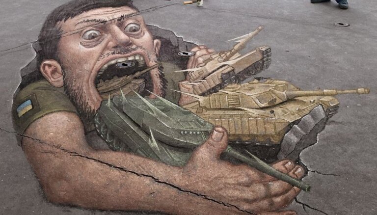 Правда ли, что в Брюсселе нарисовали граффити с Зеленским, пожирающим танки?